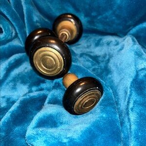 Black and Brass Dumbbell Decor with Glossy Accents